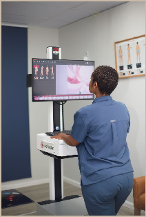 Dr Spengane using the FotoFinder system in her practice